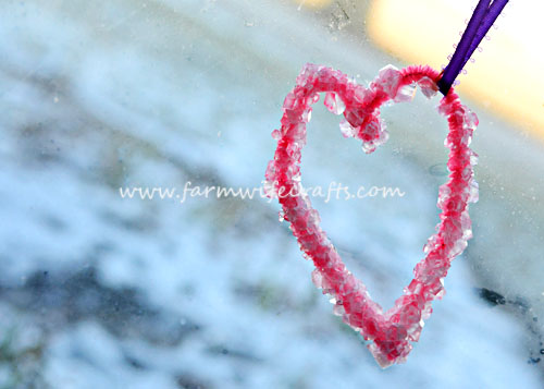 These crystal hearts with borax are a fun science experiment to celebrate Valentine's Day.