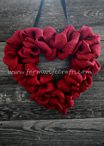 An easy to make heart burlap wreath perfect for sprucing up any door for Valentines Day.