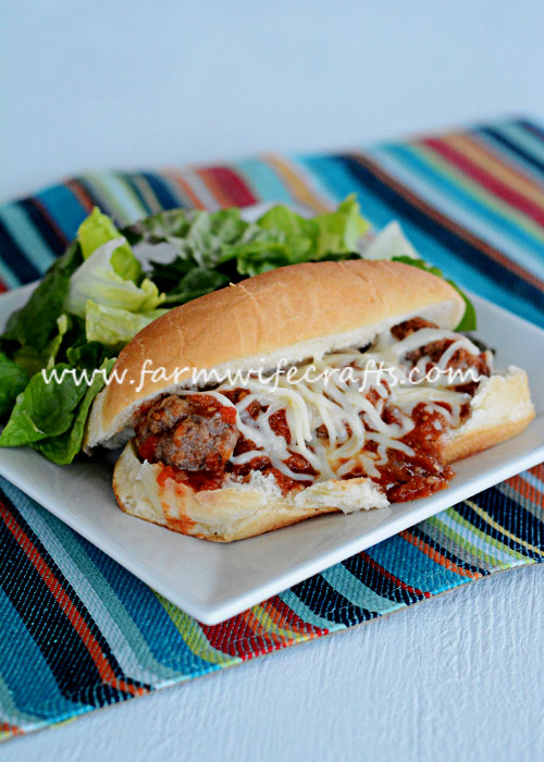 These Crockpot Meatball Hoagies from Gooseberry Patch's cookbook, Busy Day Slow Cooking are delicious and a great twist on Italian night!