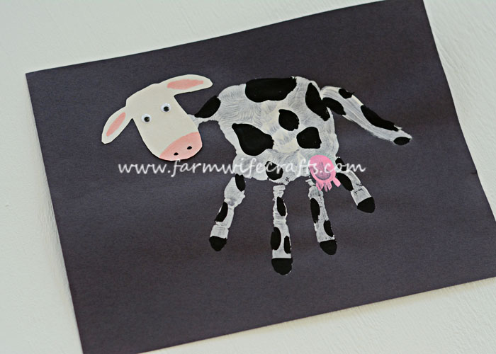 Teach your kids about dairy cows with this handprint craft.