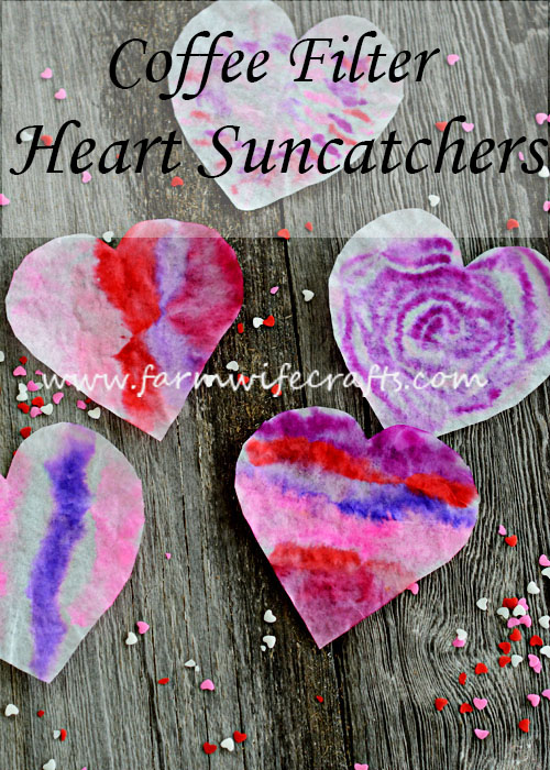 I'm definitely ready for some bright colors around here.  These Coffee Filter Heart Suncatchers are sure to brighten up any window this Valentine's Day.