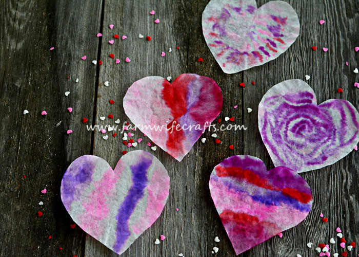 These coffee filter heart suncatchers are simple and easy to make. The bright colors look great in the window.