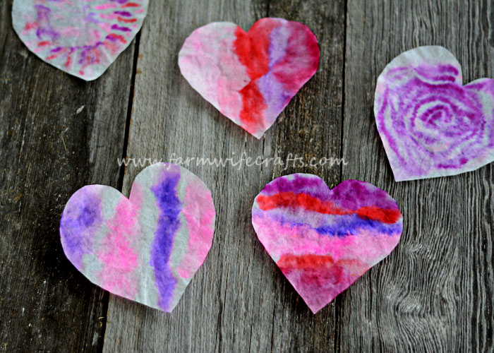 These coffee filter heart suncatchers are simple and easy to make. The bright colors look great in the window.