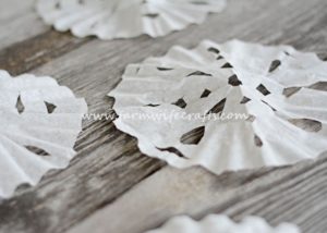 Looking for a quick, easy way to entertain the kids for a few minutes this winter? These Coffee Filter Snowflakes are the perfect cure for cabin fever!