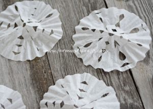 Looking for a quick, easy way to entertain the kids for a few minutes this winter? These Coffee Filter Snowflakes are the perfect cure for cabin fever!