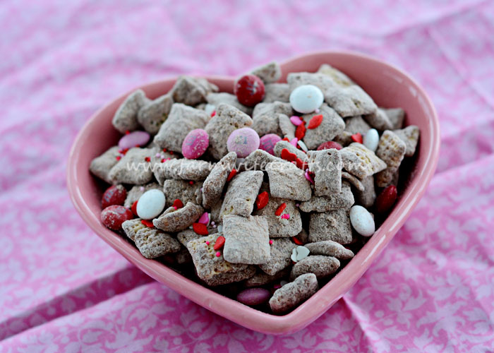 Are you looking for a Valentine's Day treat that your loved ones won't be able to resist? This Valentine's Puppy Chow is exactly what you need in your life. It's so easy to make and the perfect mixture of sweetness to make your mouth water?