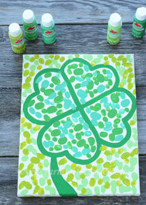 Are you looking for a craft to make with your kids this St. Patrick's Day that you can enjoy year after year. This Fingerprint Four Leaf Clover Canvas is just the thing, plus it will look adorable hanging on your wall.