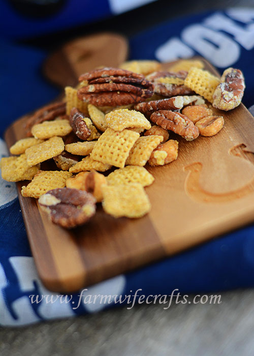 The temperatures are dropping and that can only mean one thing, harvest is almost here:)!!!  Oh wait, and football season!!!  This recipe if Crockpot Cornbread Chex-Mix is perfect for your next tailgate of football party.