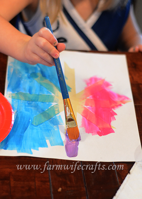 Snowflake Painting with Masking Tape - The Farmwife Crafts