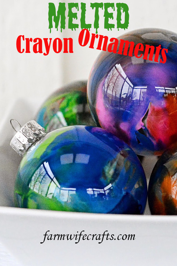 Do you have any holiday traditions?  We have a few and one of them is that the girls make a new ornament every year like these Melted Crayon Ornaments.
