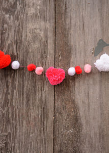 Valentine's Day is right around the corner.  I love decorating for Valentine's Day.  I don't have a lot of decorations, but what I do have, are pretty simple and the pop of color definitely brightens up the drab winter days.  This DIY Valentine's Garland is a perfect addition to our decor!