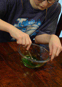 If you're looking for a simple craft to make to keep your kids entertained with items you have on hand then look no further than this Rainbow Oobleck.