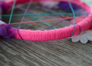 Do you have a little girl that is crazy about unicorns like mine?  This DIY Unicorn Dreamcatcher is easy to make and is sure to put a smile on her face!