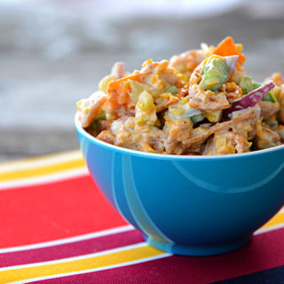 Are you looking for a different type of salad that you can take to pitch-ins this summer?  This Frito Corn Salad is just what you need in your life!
