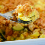 That zucchini in your garden will be ready before you know it.  One zucchini plant seems to produce about 1,459 zucchinis, so, if you're like me, you're probably looking for more recipes to use up all that zucchini and yellow squash!  This recipe for cheesy yellow squash and zucchini casserole is definitely a new family favorite!