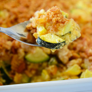 That zucchini in your garden will be ready before you know it.  One zucchini plant seems to produce about 1,459 zucchinis, so, if you're like me, you're probably looking for more recipes to use up all that zucchini and yellow squash!  This recipe for cheesy yellow squash and zucchini casserole is definitely a new family favorite!