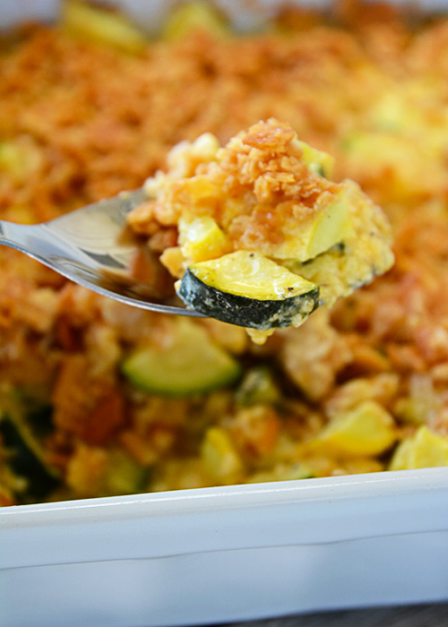 That zucchini in your garden will be ready before you know it.  One zucchini plant seems to produce about 1,459 zucchinis, so, if you're like me, you're probably looking for more recipes to use up all that zucchini and yellow squash!  This recipe for cheesy yellow squash and zucchini casserole is definitely a new family favorite!