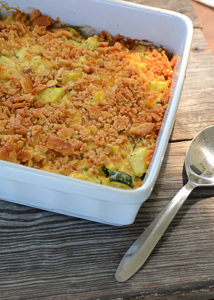 That zucchini in your garden will be ready before you know it.  One zucchini plant seems to produce about 1,459 zucchinis, so, if you're like me, you're probably looking for more recipes to use up all that zucchini and yellow squash!  This recipe for cheesy yellow squash and zucchini casserole is definitely a new family favorite!