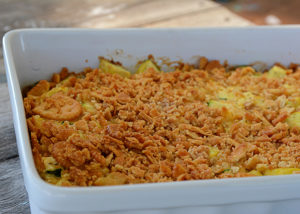 That zucchini in your garden will be ready before you know it.  One zucchini plant seems to produce about 1,459 zucchinis, so, if you're like me, you're probably looking for more recipes to use up all that zucchini and yellow squash!  This recipe for cheesy yellow squash and zucchini casserole is definitely a new family favorite!