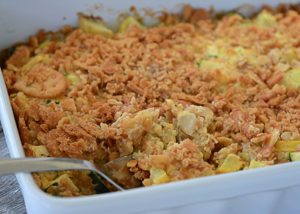 That zucchini in your garden will be ready before you know it.  One zucchini plant seems to produce about 1,459 zucchinis, so, if you're like me, you're probably looking for more recipes to use up all that zucchini and yellow squash!  This recipe for cheesy yellow squash and zucchini casserole is definitely a new family favorite!