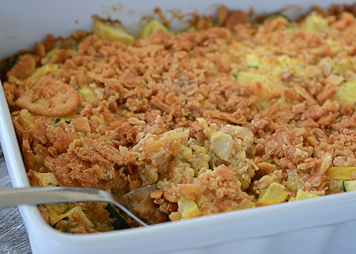 That zucchini in your garden will be ready before you know it.  One zucchini plant seems to produce about 1,459 zucchinis, so, if you're like me, you're probably looking for more recipes to use up all that zucchini and yellow squash!  This recipe for cheesy yellow squash and zucchini casserole is definitely a new family favorite!
