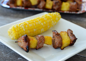 Summer means grilling and grilling means less mess in the kitchen.  My absolute favorite meal is a toss up between everything coming from the garden and everything being prepared on the grill!  This recipe for Grilled Teriyaki Pork and Pineapple Skewers is the perfect summertime meal!