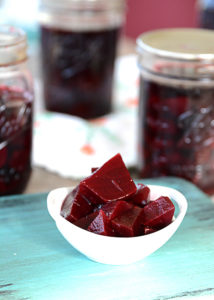 This seems to be the year that people are growing a garden that haven't had one in the past.  Maybe some of you are trying new garden veggies and are wondering what you can do with all that glorious goodness that your garden is producing.  I'm sharing one of our family's favorite garden recipes with you...pickled beets.  Wondering how to can pickled beets?  Don't worry, I'll explain and you'll be surprised at how easy it is!