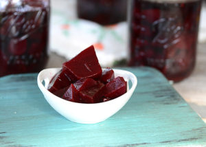 This seems to be the year that people are growing a garden that haven't had one in the past.  Maybe some of you are trying new garden veggies and are wondering what you can do with all that glorious goodness that your garden is producing.  I'm sharing one of our family's favorite garden recipes with you...pickled beets.  Wondering how to can pickled beets?  Don't worry, I'll explain and you'll be surprised at how easy it is!