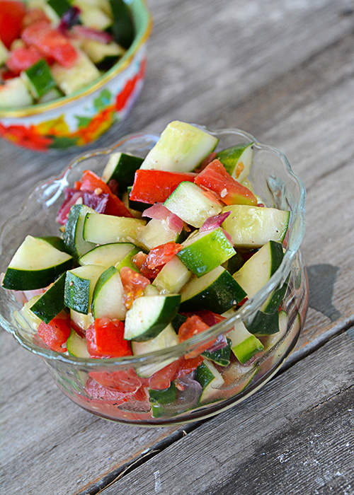 There's nothing like the fresh taste a salad that comes straight from the garden.  This Tomato Cucumber Salad tastes great all year long, especially when the main ingredients come straight from your very own garden!