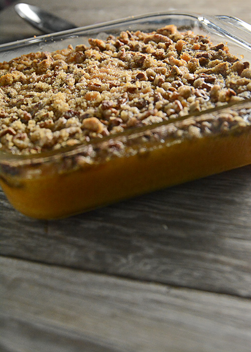 Trying to figure out what to take to that holiday pitch-in?  This Sweet Potato Casserole is a favorite at our holiday get-togethers