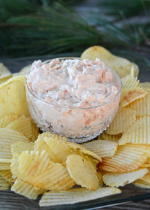 Are you looking for a decadent appetizer to serve at your holiday gathering?  Look no further than this recipe for Shrimp Dip!