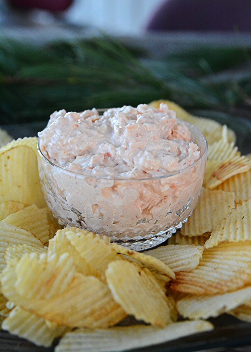 Are you looking for a decadent appetizer to serve at your holiday gathering?  Look no further than this recipe for Shrimp Dip!