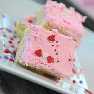 Do you love iced sugar cookies?  Then you need to try these Fluffy Sugar Cookie Bars.  Easy to whip up and with just the right amount of almond flavor they are delicious!