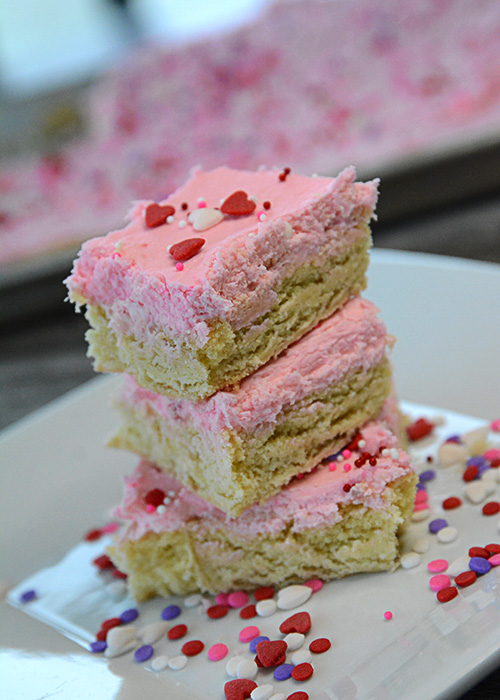 Do you love iced sugar cookies?  Then you need to try these Fluffy Sugar Cookie Bars.  Easy to whip up and with just the right amount of almond flavor they are delicious!