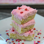 Do you love iced sugar cookies?  Then you need to try these Fluffy Sugar Cookie Bars.  Easy to whip up and with just the right amount of almond flavor they are delicious!