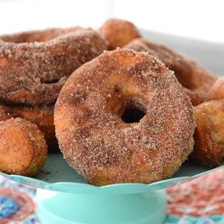 Who loves donuts?  Who doesn't have a donut shop within a 15 mile radius of their house?  Both of those questions apply at our house, so when I discovered you could make donuts in your air fryer, I couldn't wait to make them!  These Easy to Make Air Fryer Donuts will be a hit in your house!