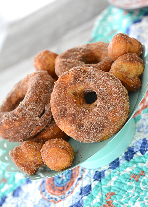 Who loves donuts?  Who doesn't have a donut shop within a 15 mile radius of their house?  Both of those questions apply at our house, so when I discovered you could make donuts in your air fryer, I couldn't wait to make them!  These Easy to Make Air Fryer Donuts will be a hit in your house!