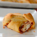 Are you looking for an easy to make weeknight meal?  These pizza calzones are so easy to whip up you can even ask one of your kids to do it...or your husband!