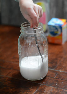 If you are looking for a something to keep your kids entertained this winter, you have to try this Snowstorm in a Jar experiment.