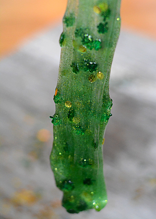 Are you looking for a green craft to celebrate St. Patrick's Day with your kids or students?  This St. Patrick's Day Green Slime is easy to whip up with just a few household ingredients.